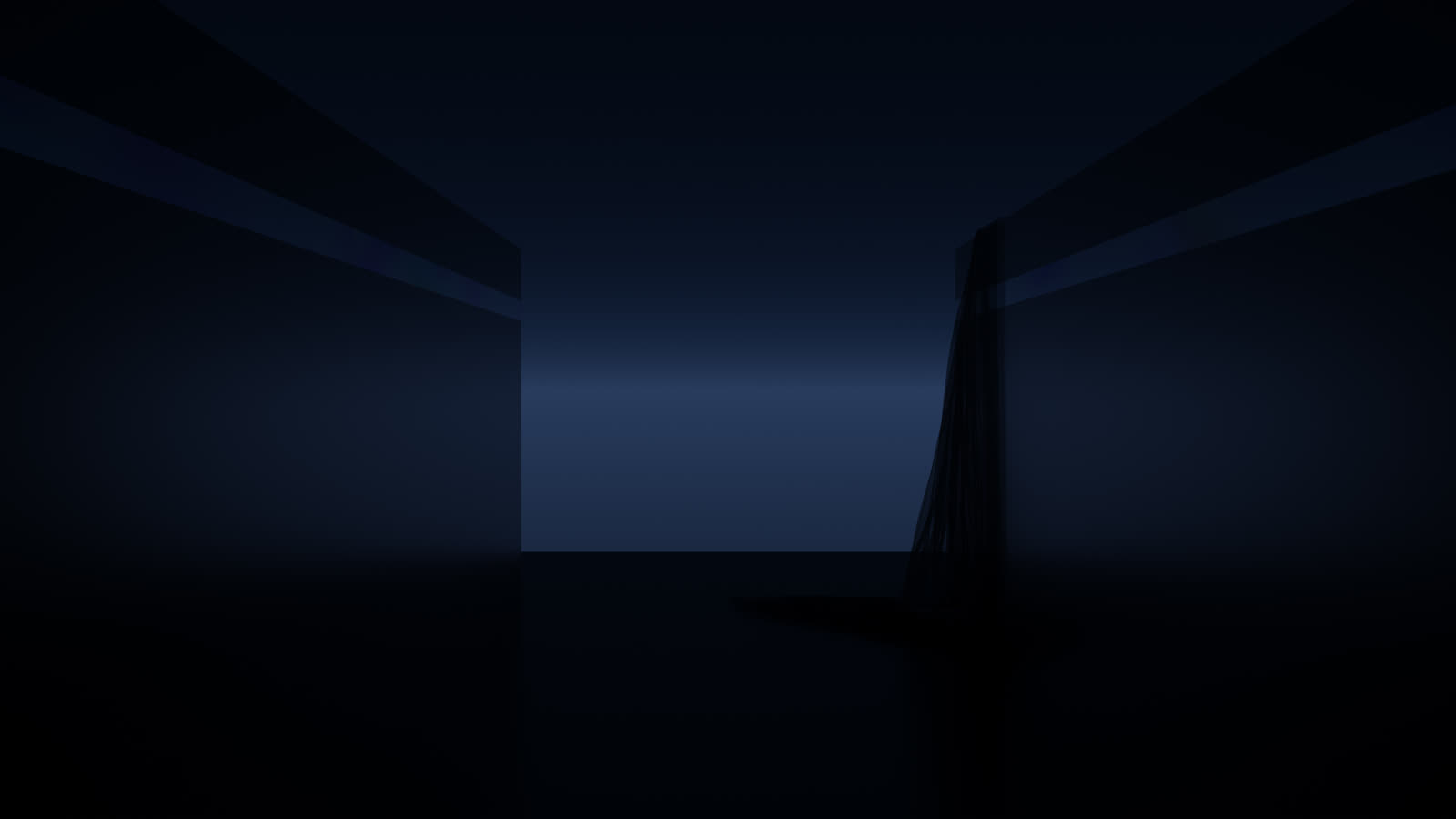 An empty blue-lit hallway fading into darkness